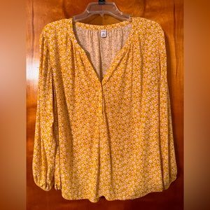Women’s bright sunny & happy blouse. Adorable all over flower print with V-neck.